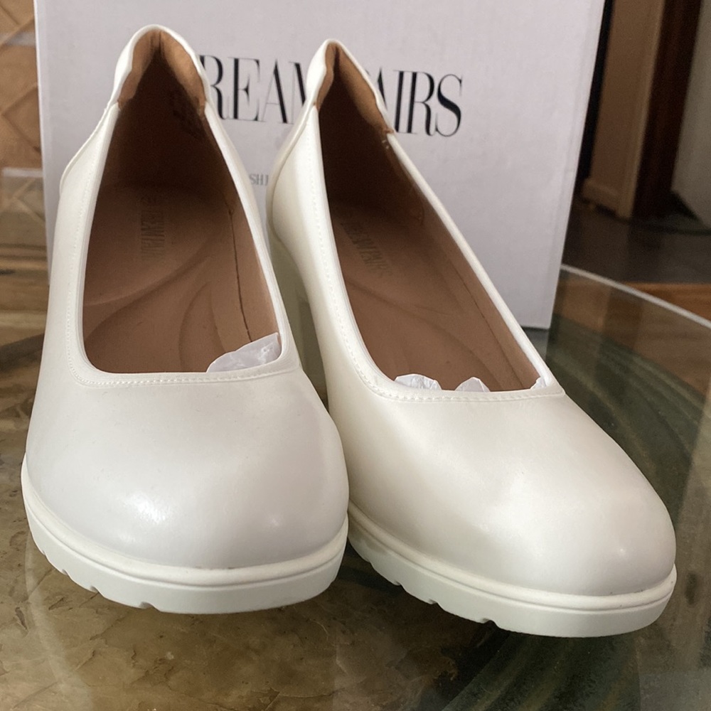 Brand new comfy white pumps with rubber soles!